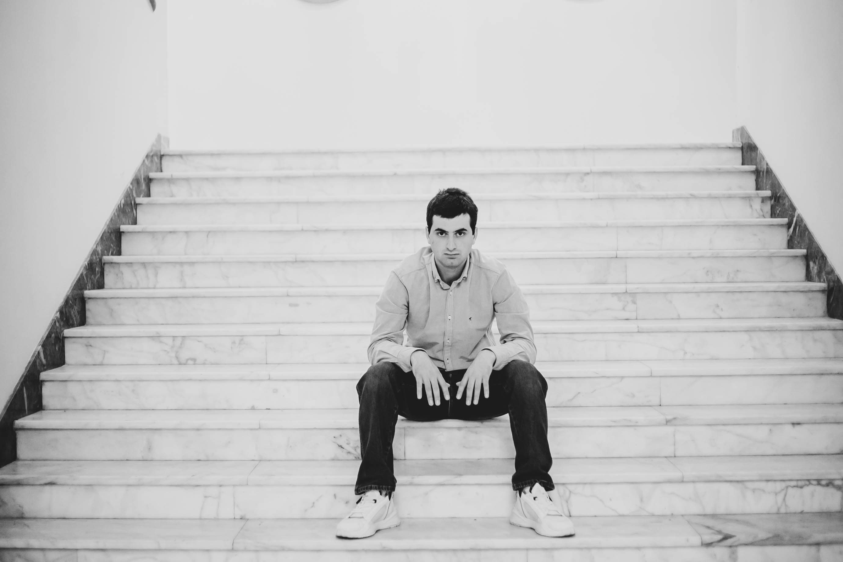 Hands on piano keys close up